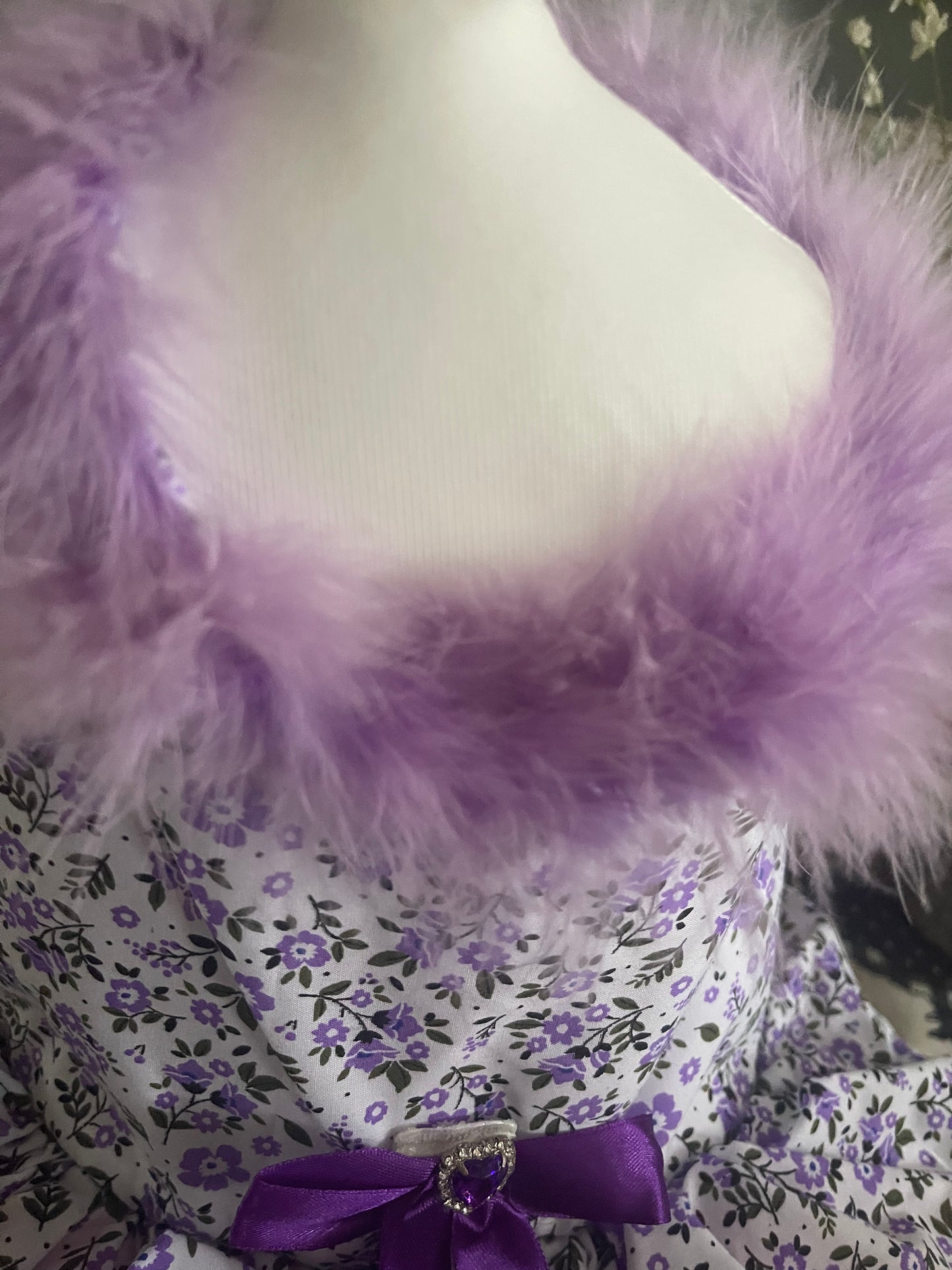 Purple People Lover with a purple feather boa collar