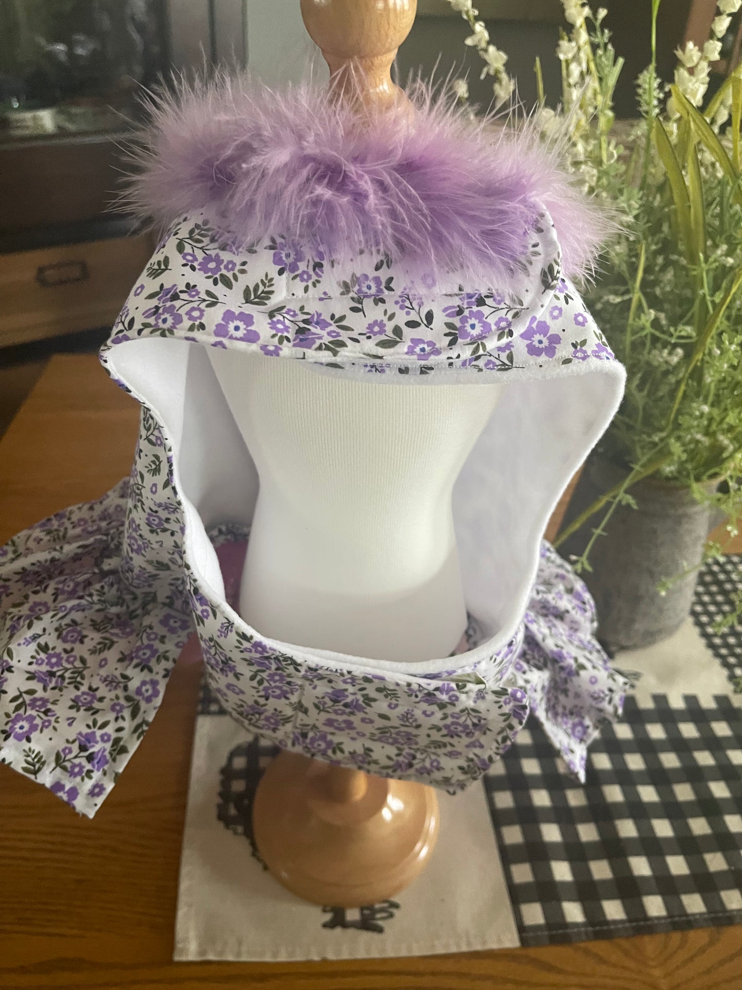 Purple People Lover with a purple feather boa collar