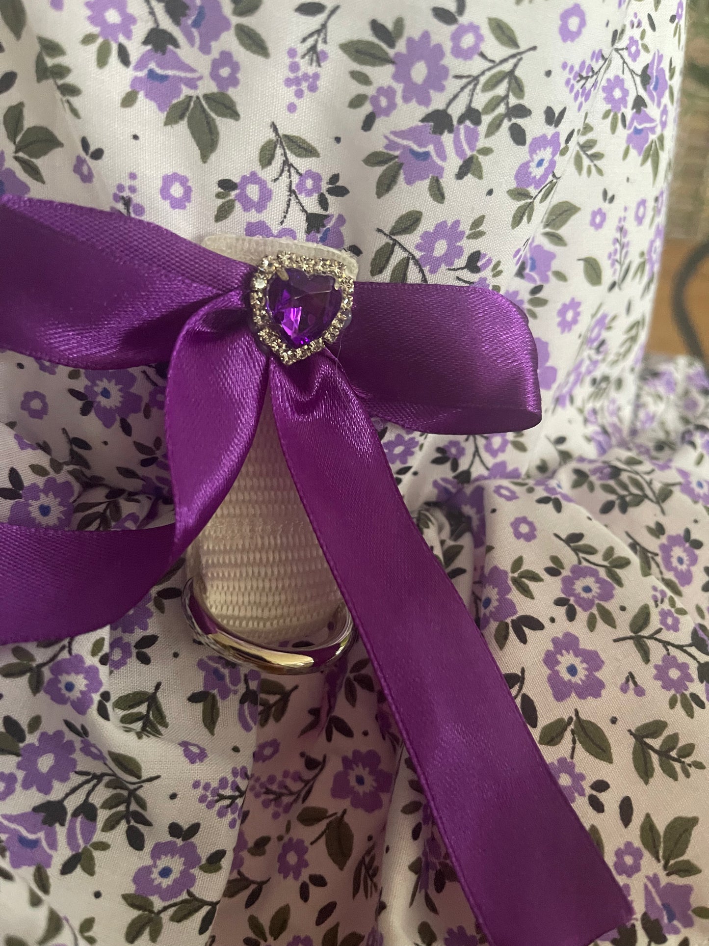 Purple People Lover with a purple feather boa collar